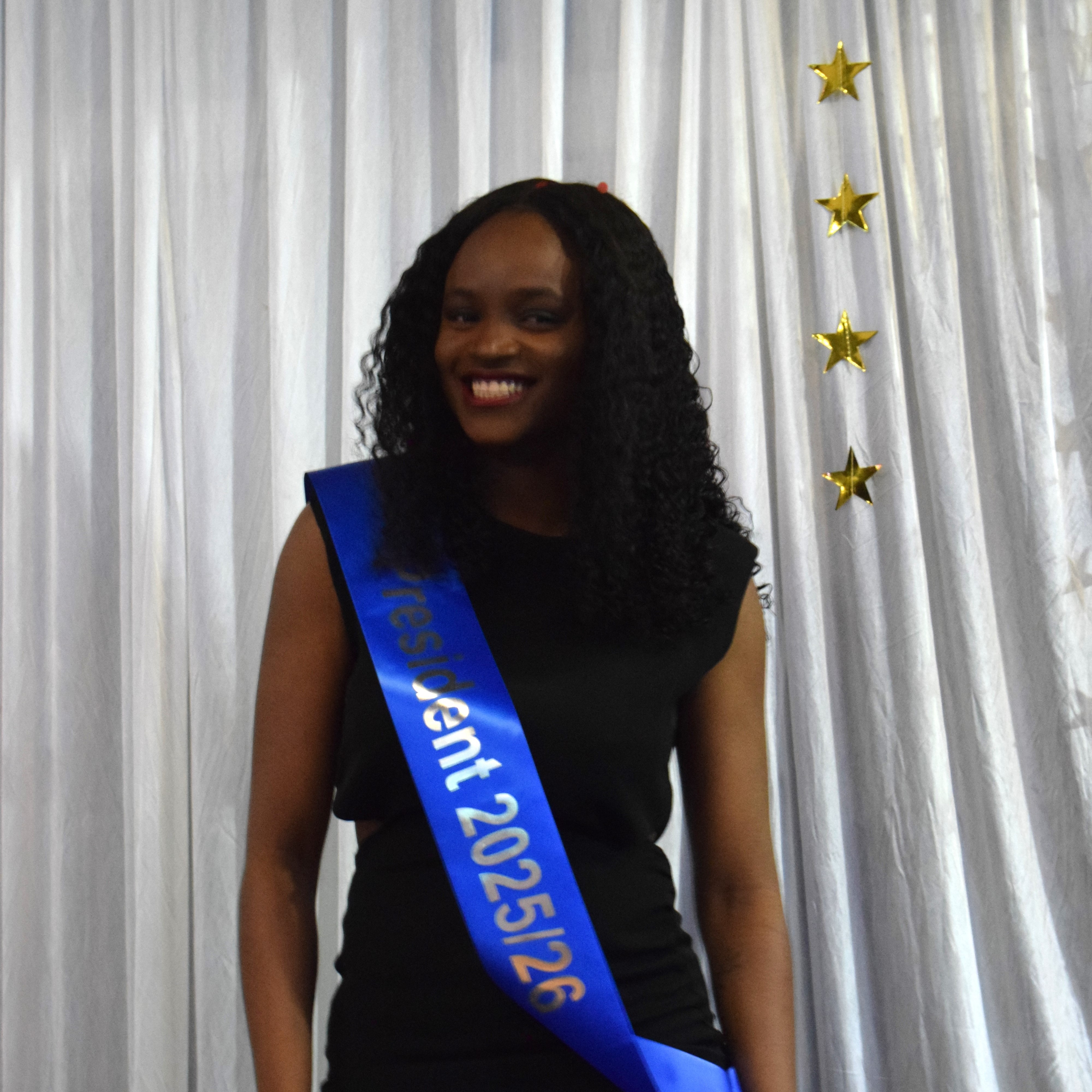 A photograph of SU President, Ruttuja Mane