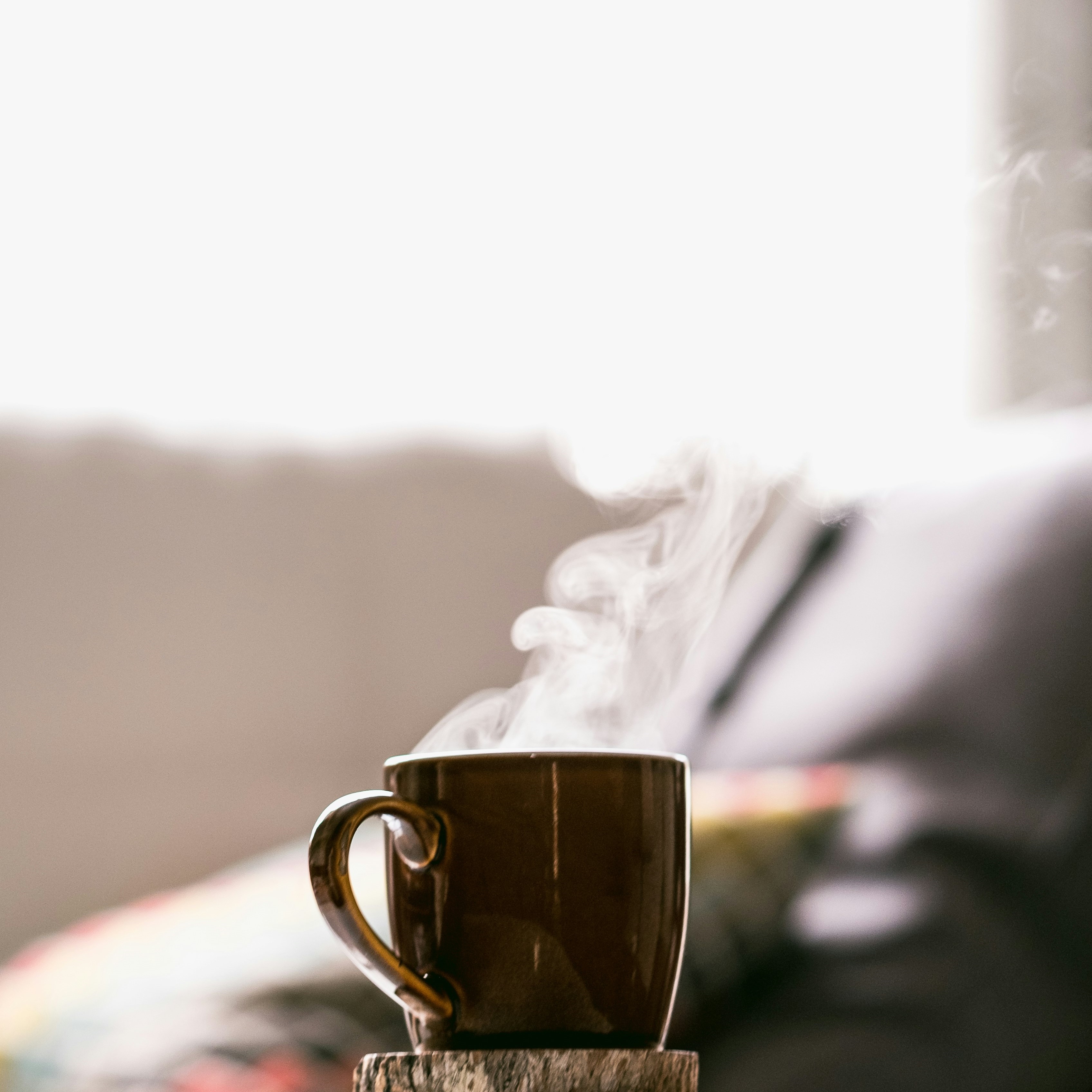 Picture showing a cup of coffee with steam coming off it